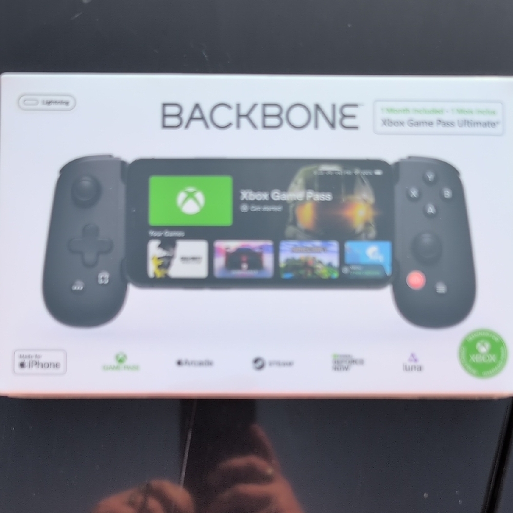 Black Handheld Gaming Console with Mobile Integration